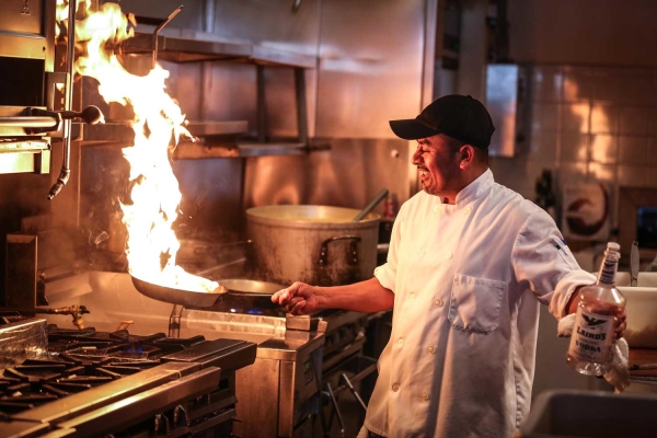 commercial kitchen equipment oven stove top range chef cooking with pan
