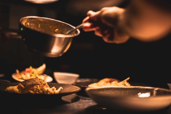 Commercial kitchen equipment plating up dishes serve ware at the pass